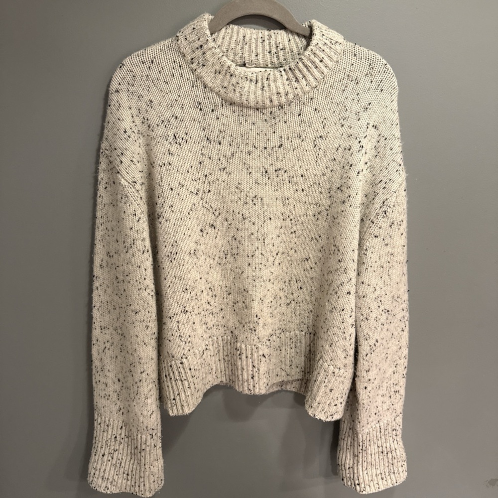 Elegant Cream Speckled Turtleneck Sweater